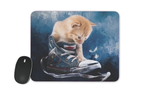 Cute kitten plays in sneakers für Mousepad